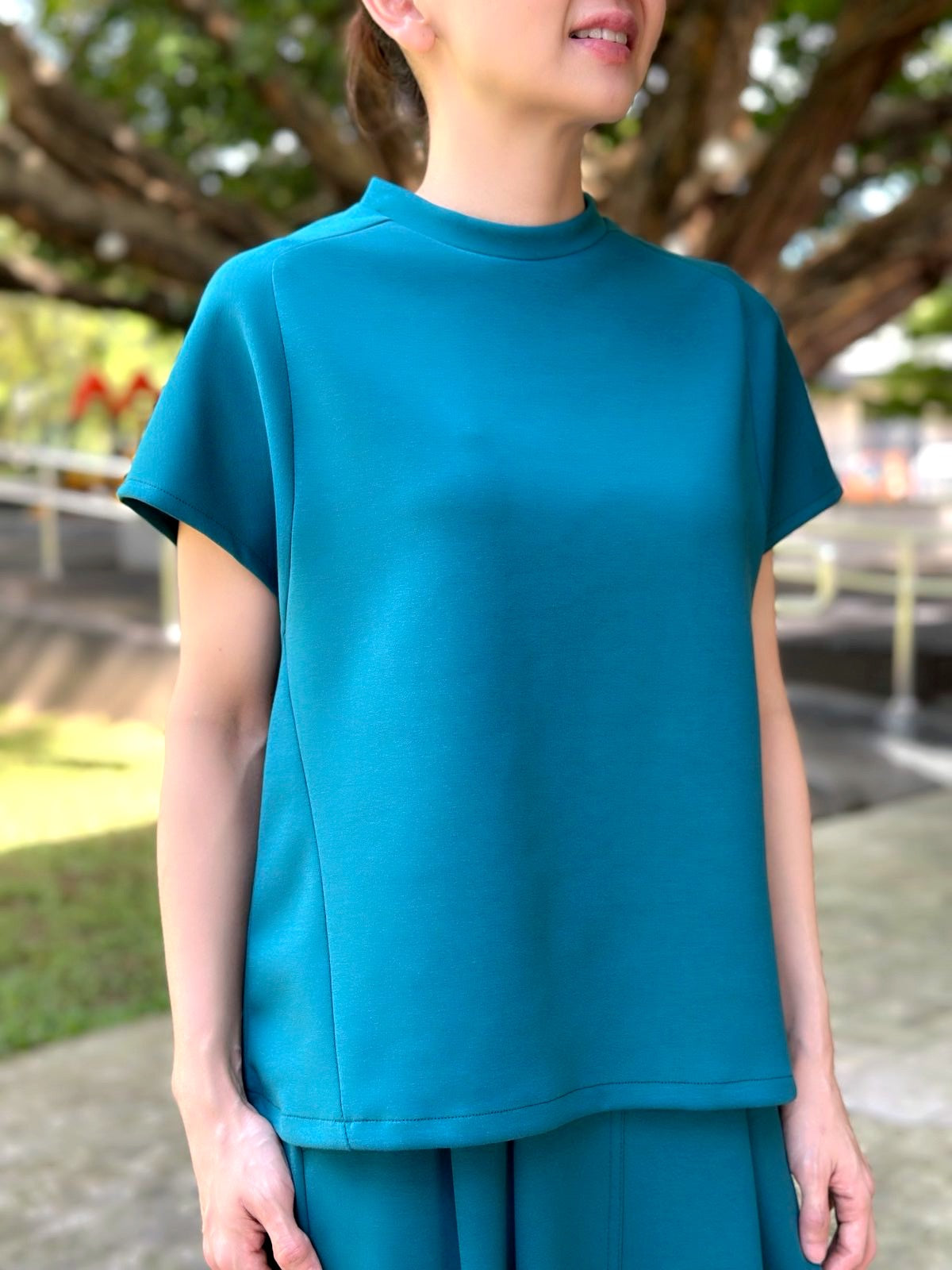 Jiang Tee in Teal